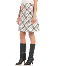 Load image into Gallery viewer, Polished in plaid, this bias-cut tartan skirt offers a figure-flattering silhouette. This skirt pairs perfectly with our Rose Drape Neck Turtleneck Lightweight Sweater.