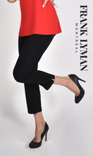 Load image into Gallery viewer, Our Frank Lyman Sophie capris are the perfect addition to any wardrobe. An oh-so-soft knit creates a comfortable capri while the side slits create an edge. A classic black capri, it effortlessly goes with almost everything in your closet.