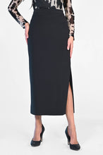 Load image into Gallery viewer, Our black knit long skirt by Frank Lyman is a gorgeous addition to your wardrobe as it pairs perfectly with a number of tops. A classic piece, our Bristol skirt is a flattering style with a side slit, giving it a sophisticated feel.