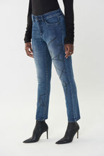 Load image into Gallery viewer, As unique as it is bold, our basic blue denim jean by Joseph Ribkoff is taken to new heights with its bold scribble pattern in black rhinestone embellishment. A perfect statement piece to pair with your favorite top, you will definitely receive compliments on this fabulous jean.