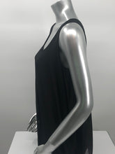 Load image into Gallery viewer, You need look no further for the perfect black sleeveless top because our Clea is the one! A beautiful sheer flowy fabrication on the outside with a knit tank inside gives this style a perfect flair. Black goes well with everything in your closet and this black top will pair beautifully with everything in your closet.