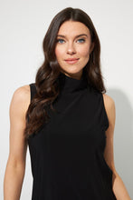 Load image into Gallery viewer, Simply a classic style that can be layered under your favorite jacket or blazer yet, looks stunning on its own. Semi-fitted, our Skylar sleeveless top features a flattering mock neck. Color- Black. Mock neck. Sleeveless. Perfect stretch. Unlined. Fabric-96% Polyester. 4% Spandex.
