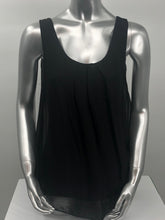 Load image into Gallery viewer, You need look no further for the perfect black sleeveless top because our Clea is the one! A beautiful sheer flowy fabrication on the outside with a knit tank inside gives this style a perfect flair. Black goes well with everything in your closet and this black top will pair beautifully with everything in your closet.