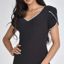 Load image into Gallery viewer, An enchanting dress, the Bellamy is the ideal style for your special occasions. This perfect black dress is offset with sparkling crystal rhinestones edging the neckline and sleeves, while the V-neck and tulip design sleeves are added details that create an alluring look. Color- Black with white crystal rhinestones. V-Neck. Tulip sleeves. Fabric-95% Polyester. 5% Elastane.