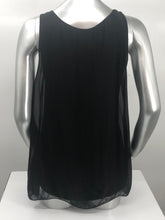 Load image into Gallery viewer, You need look no further for the perfect black sleeveless top because our Clea is the one! A beautiful sheer flowy fabrication on the outside with a knit tank inside gives this style a perfect flair. Black goes well with everything in your closet and this black top will pair beautifully with everything in your closet.