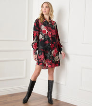 Load image into Gallery viewer, Vibrant florals in rosy hues bloom over this breezy shirtdress. So many different styling options are made possible with this stunning dress. Add a belt for an effortless look with neutral shoes- or wear it as a jacket unbuttoned with jeans and a simple top. Or pair with your favorite black leggings and tall boots. So many endless possibilities! Color- Red, black and white. Long sleeve button cuff. Slightly oversized. Point collar Button down