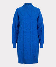 Load image into Gallery viewer, A piercing bright blue color dazzles on this mesmerizing Bettina dress. The classic cable pattern and ribbed cuffs, along with a slightly oversized fit, creates a style that will become your next fashion favorite. Our Bettina is a beautiful piece to style with leggings and boots or choose to wear alone with boots or heels. Color- Blue. Pull-over style. Mock-neck. Ribbed cuffs.