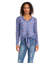 Load image into Gallery viewer, Various floral and shapes print in colorful blue and red hues brings this figure flattering tie front top to life. The addition of shimmering metallic lurex makes it the perfect way to dress up any outfit. Color- Red and blue. Long sleeve button cuff. V-neck. Tie-front.