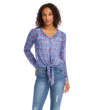 Load image into Gallery viewer, Various floral and shapes print in colorful blue and red hues brings this figure flattering tie front top to life. The addition of shimmering metallic lurex makes it the perfect way to dress up any outfit. Color- Red and blue. Long sleeve button cuff. V-neck. Tie-front.