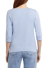 Load image into Gallery viewer, A definite classic, this timeless design has been a must-have over the years for style icons like Audrey Hepburn. Now, modern-day you can be a style icon in your own right when you wear our Oaklyn top. Wear with your favorite jeans and flats or pair under your favorite jacket for an easy and effortless look that will be fashionable forever. Color- Oxford Blue; light blue. Pop-over boat neck. Relaxed fit. Neckline with inside facing.