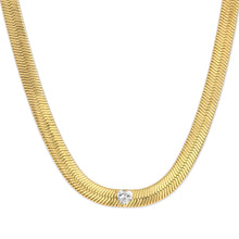 Load image into Gallery viewer, Our Capulet Gold Herringbone and Heart Necklace is absolutely stunning! This special necklace is 7 mm of liquid gold with a 5mm cubic zirconia heart set in the middle of the herringbone. Pair it with our Capulet Gold Herringbone and Heart Bracelet and Capulet Gold Herringbone and Heart Ring for the complete brilliant look.