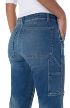 Load image into Gallery viewer, Our Regan Retro Carpenter Jean gives a vintage vibe with modern style details. Just the right amount of stretch gives our Regan a comfortable fit while the slight distressing creates a trendy look. Pair with your favorite sweater or top and a pair of sneakers and you're ready to take on the day! Color- Echo Park. Vintage stretch denim fabrication. Carpenter pant silhouette. Flat front with belt loops. Two front slant pockets. Two back patch pockets.