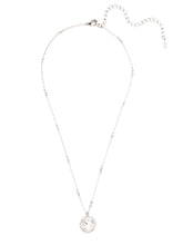 Load image into Gallery viewer, All around allure. This necklace features a rounded-edge, cushion cut stone that is encircled by a vintage inspired decorative edged border. A delicate chain completes the look.