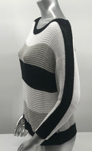 Load image into Gallery viewer, For those cool summer nights, or Caryl sweater is the perfect piece to keep warm. Not too heavy and not too light, this knit sweater is fashionable and functional. The colorblock colors in white, gray and black are so on trend and literally goes with so many different bottoms. As this 3/4 sleeve sweater is not a tight knit, it is slightly see-through. Wear over a bralette, tank or nude bra if preferred.