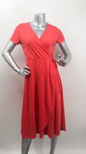 Load image into Gallery viewer, Look absolutely stunning in this vibrant red-orange modal dress by Mimi K. The Willow dress, made of Modal fabric, is lightweight, stretchy, and breathable and doesn't wrinkle easy, making it a travel worthy piece. Willow has a look of a wrap dress but is actually one piece with a tie on the side.