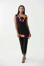Load image into Gallery viewer, Spectacular splashes of color in orange, white, and fuchsia line the draping on the neck and asymmetrical bottom hem on this stunning sleeveless black tunic top. Another smart modern design by Joseph Ribkoff, this tunic will make you stand out in a crowd. Like you, our Sophia Tunic is unique in its own right.