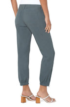 Load image into Gallery viewer, A super soft and chic pant, you will be so comfortable, you will grab these pants again and again! This fabulous pant features a side zip at the hem to add extra flair. Truly a perfect pant for any time of the year! Color- Teal Lagoon. 27'' Inseam. Mid-rise Set-in waistband.