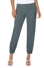 Load image into Gallery viewer, A super soft and chic pant, you will be so comfortable, you will grab these pants again and again! This fabulous pant features a side zip at the hem to add extra flair. Truly a perfect pant for any time of the year! Color- Teal Lagoon. 27'' Inseam. Mid-rise Set-in waistband.