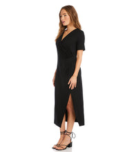 Load image into Gallery viewer, Simply elegant and classy is our Alicia Faux Wrap Midi Dress by Karen Kane. A perfect evening-ready midi dress is designed and made from fluid jersey-knit fabric that offers an eye-appealing draping. A side-slit on the left side offers an even greater interest in this gorgeous midi dress.