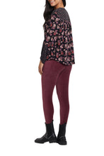 Load image into Gallery viewer, Our stretchy Robin corduroy legging is oh so comfortable. This is not like corduroy of days past. This stretchy material moves easily with you. Made using Tribal Apparel's trademark Flatten It® technology, a mesh tummy control panel gently slims and flaunts a flattering silhouette. A hidden elastic waistband gives you a smooth shape, and subtle dream seams make these leggings figure-friendly. Color- Ruby wine. Pull on waist.