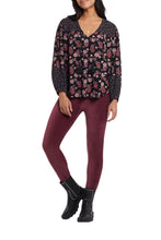 Load image into Gallery viewer, Our stretchy Robin corduroy legging is oh so comfortable. This is not like corduroy of days past. This stretchy material moves easily with you. Made using Tribal Apparel's trademark Flatten It® technology, a mesh tummy control panel gently slims and flaunts a flattering silhouette. A hidden elastic waistband gives you a smooth shape, and subtle dream seams make these leggings figure-friendly. Color- Ruby wine. Pull on waist.