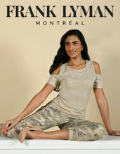 Load image into Gallery viewer, A striking gold metallic reptile print creates a denim pant that is so very exquisite. A slim fit with stretch, this versatile pant can be dressed up for a night out or worn casually while running errands. One thing is for certain, you will not blend in with a crowd, when you wear this stunning pant.