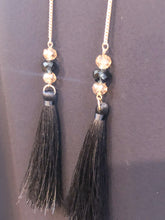 Load image into Gallery viewer, Our Frank Lyman designed Tamela dress is a gorgeous dark navy called Twilight. A perfect alternative to a black dress, this beauty is elevated in design with a detachable necklace in gold, navy and gold beads and twilight navy fringe. Slight ruffle detailing at the neckline as well as the bottom adds even more interest. A gorgeous style for those special events, you will feel beautiful every time you wear this dress.