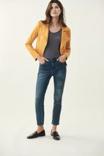 Load image into Gallery viewer, Inspired by the 60's model Twiggy, the Brielle Jean with Sparkle Face Design is truly a work of art that you can wear. This beautiful and comfortable ankle length, classic slim blue jean has a partial female face design on the left leg created with a series of gorgeous sparkling black crystals. You will definitely receive numerous compliments when you wear this work of art. Color- Blue with black crystals.