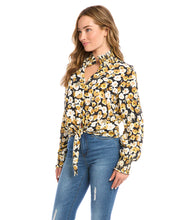 Load image into Gallery viewer, Add a dash of old-world romance to your wardrobe with our Fiona top with smocked sleeves, dramatic collar and tie front. With its unique design, this beautifully unique top can be dressed up or worn casually. You'll be sure to receive compliments when you style this beautiful top. Color-Black, white and gold. Long sleeve with smocked cuff. V-neck with smocked collar.