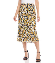 Load image into Gallery viewer, Add a romantic feature to your wardrobe with this floral garden print midi skirt. Our Gia skirt is designed with an easy pull-on silhouette that flows away from the body in streamlined sophistication. For a gorgeous look, pair with our GEORGIA GOLD SATIN LONG SLEEVE BUTTON DOWN SHIRT. Color- Black, white and gold. Floral print Elasticized waistband. Bias cut. Mid-rise Floral print