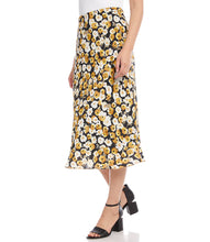 Load image into Gallery viewer, Add a romantic feature to your wardrobe with this floral garden print midi skirt. Our Gia skirt is designed with an easy pull-on silhouette that flows away from the body in streamlined sophistication. For a gorgeous look, pair with our GEORGIA GOLD SATIN LONG SLEEVE BUTTON DOWN SHIRT. Color- Black, white and gold. Floral print Elasticized waistband. Bias cut. Mid-rise Floral print