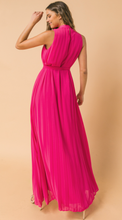 Load image into Gallery viewer, A stunning fuchsia color on this magnificent dress is all that and the design is a classic that will never go out of style. Our Tanya dress has baby pleats and features a round neckline with baby ruffled edge. The Maxi has a self-sash tie and back keyhole button closure. Stand out from the crowd this summer in a dress that will definitely turn heads!