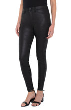 Load image into Gallery viewer, The signature Madonna legging in a black coated knit offers a classic look with a bit of edge with its subtle shine! Unique and classy, these leggings will look stunning paired with any top. Incredible comfort, the Madonna legging fits true to size, stretches with every movement but has fabulous recovery and does not end up bagging. Stand out in a crowd with these attention-grabbing leggings! You will not be disappointed! Color- Black. 29'' Inseam. Hi-rise.
