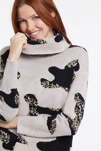 Load image into Gallery viewer, A cozy sweater is a must-have for cool weather, and we're currently obsessed with this playful printed double-knit style. A slightly cropped length, boxy fit, and draped cowl neckline have us excited to add this to our regular wardrobe rotation. Color- Light camel, black and very slight yellow brushstrokes. Pop-over cowl neck. Boxy fit. Drop shoulder. Slightly cropped length. Soft intarsia knit.