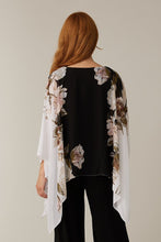 Load image into Gallery viewer, Stunning in all ways, this gorgeous, flowy cape sleeve top by Joseph Ribkoff is definitely a head turner. Black, white, pink, and olive colors come together in a floral print to create a lovely top that easily can we worn all year long. Colors-Black, white, pink, olive green. Cape sleeve. Flowy material lays over a black tank lining. V-neck.