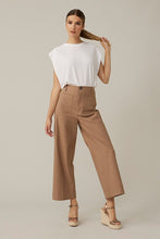 Load image into Gallery viewer, A top that goes with literally everything in your closet, our Wenda white drop sleeve is the perfect style to have on hand for all your needs. The Wenda is an elevated look, not quite a traditional short sleeve and not a tank but a perfect combination of the two. Simple, yet classic, the Wenda looks beautiful worn alone or under a jacket.