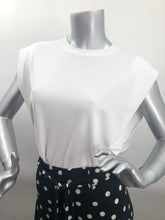 Load image into Gallery viewer, A top that goes with literally everything in your closet, our Wenda white drop sleeve is the perfect style to have on hand for all your needs. The Wenda is an elevated look, not quite a traditional short sleeve and not a tank but a perfect combination of the two. Simple, yet classic, the Wenda looks beautiful worn alone or under a jacket.