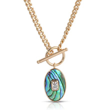Load image into Gallery viewer, There are statement necklaces, and then there is this striking abalone piece. Shimmering colors pop on this pendant while a crystal baguette accent glimmers with each movement. This lovely necklace is just as unique as you.