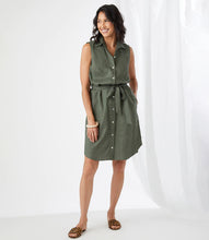 Load image into Gallery viewer, A look that can easily transition from day to evening, our Olena dress is the perfect style for those hot, summer days. Made with lightweight and breathable linen, you are sure to stay cool and comfortable when wearing this fabulous dress. Our Olena by Karen Kane has a figure-defining belt, buttons down the front, and convenient pockets. You can even change up the look and wear unbuttoned as a summer duster. Color- Olive. White pearl buttons.