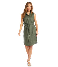 Load image into Gallery viewer, A look that can easily transition from day to evening, our Olena dress is the perfect style for those hot, summer days. Made with lightweight and breathable linen, you are sure to stay cool and comfortable when wearing this fabulous dress. Our Olena by Karen Kane has a figure-defining belt, buttons down the front, and convenient pockets. You can even change up the look and wear unbuttoned as a summer duster. Color- Olive. White pearl buttons.