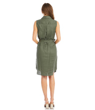 Load image into Gallery viewer, A look that can easily transition from day to evening, our Olena dress is the perfect style for those hot, summer days. Made with lightweight and breathable linen, you are sure to stay cool and comfortable when wearing this fabulous dress. Our Olena by Karen Kane has a figure-defining belt, buttons down the front, and convenient pockets. You can even change up the look and wear unbuttoned as a summer duster. Color- Olive. White pearl buttons.
