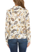 Load image into Gallery viewer, Not only is our Paula shirt, versatile, but also quite lovely as it captures the eye with a striking paisley print and relaxed fit. This top can be worn for almost any occasion from work to play. Pair with your favorite denim or solid bottom for a put together, classic look. Color-Gold, blue, white. Button down. Point collar. Long sleeves. Unlined. Relaxed fit. No stretch.