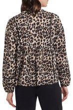 Load image into Gallery viewer, A colorful and fun pattern print comes alive on this dolman sleeve blouse. A bold abstract print combines with a leopard print to create a uniquely beautiful design. The Trisha long sleeve blouse is a perfect top to dress up or wear casually with jeans. Any way you decide to style this gorgeous top, you will definitely stand out as a fashionista! Color- Taupe grey, pinks, gold, red. Dolman sleeve. Self-tie at neck. Multi print. Pop-over notch neck with tassel trim. Flowy fit.