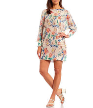 Load image into Gallery viewer, A perfect style to include in your wardrobe, this lightweight sweater is so versatile! Wear as a sweater dress or pair with your favorite bottoms and style as a tunic. Lightweight enough for the spring/summer but also a perfect weight to keep you warm in the fall/winter. A beautiful vibrant flower really pops on the beige background! Colors- Green, pink, orange, yellow, blue and beige. Lightweight knitted sweater. Long sleeve.