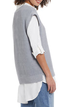Load image into Gallery viewer, The hottest trend this season is a sweater vest over a long sleeve shirt. Our Silvia sweater vest in grey mix is the perfect style to show off this trend! V-neck, wide band hem and cap sleeve design gives this sweater vest ultimate flair. Layer over our WYLER WHITE ROLL UP SLEEVE SHIRT (pictured) for the perfect trendsetting look! Color- Grey mix. V-neck design. Wide band hem.