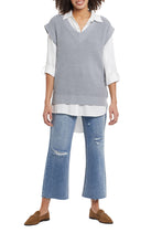 Load image into Gallery viewer, There's nothing better than a flowy tunic top to elevate any outfit! This flowy white button up shirt has all the classic details we love including a hidden button placket, roll-up tab cuffs, a chest patch pocket and curved shirttail hem on a high lo look. Proudly wear on its own or put under a sweater vest, which is this season's hottest look!
