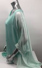 Load image into Gallery viewer, Imagine wearing this incredible top at an outdoor party or out to dinner with friends. A glorious flowy fabrication creates a stunning tunic in a mint tie dye pattern. Create a classy and fashion forward look with this tunic by pairing it with white bottoms or black slacks.