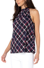 Load image into Gallery viewer, A beautiful statement piece, this sleeveless mock neck tank will take you effortlessly from day to evening. Unique textured plaid in colors of lollipop red, white and navy pairs beautifully with jeans, white bottoms and shorts. Textured bold stripes crisscross and give this fabulous top a chic look.