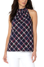 Load image into Gallery viewer, A beautiful statement piece, this sleeveless mock neck tank will take you effortlessly from day to evening. Unique textured plaid in colors of lollipop red, white and navy pairs beautifully with jeans, white bottoms and shorts. Textured bold stripes crisscross and give this fabulous top a chic look.