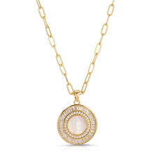 Load image into Gallery viewer, This gorgeous Mother Mary Necklace features a silhouette of Mary in genuine mother of pearl in a gold setting surrounded by cubic zirconia baguette accents. Pendant hangs from a drawn cable chain.